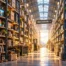 A vast warehouse filled with AI tools and business technology, representing opportunities for workflow optimization and automation.